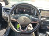 a steering wheel and dashboard of a car in a car showroom