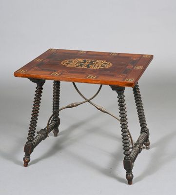 an image of a small table with a wooden top and metal legs
