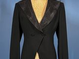 an image of a suit on a mannequin stand
