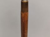 a close up of a baseball bat on a table