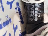 a close up of a person ' s hand holding a bag of food