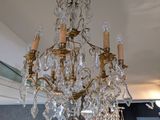 a chandelier hanging from the ceiling in a room
