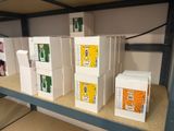 many boxes on a shelf in a store