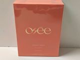 a close up of a box of perfume on a table