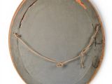 a picture of a gray plate with a rope around it
