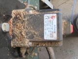 a close up of a piece of wood on a machine