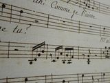 a sheet of music that has been written on it