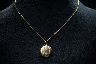 a close up of a necklace on a mannequin mannequin mannequin mannequin mannequin mannequin mannequin mannequin