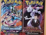 Deux cartes Pokémon sont posées l'une à côté de l'autre sur une table.