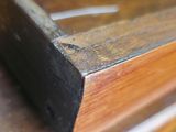 a piece of wood that is sitting on top of a desk