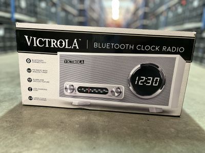 a picture of a bluetooth clock radio in a box