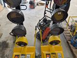 two lights that are sitting on top of a pallet
