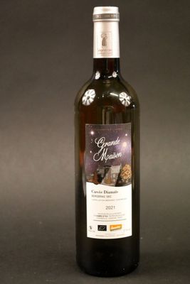 a bottle of wine that is sitting on a table
