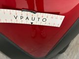 a sticker on the back of a red motorcycle that says vpauto