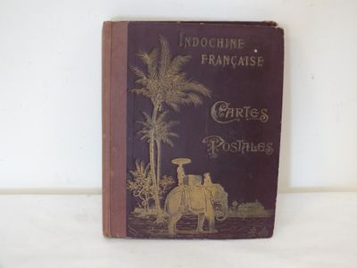 un vieux livre sur lequel figure l'image d'un homme chevauchant un éléphant