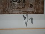 a picture on the wall of a bathroom with graffiti on it