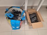 a box with a bunch of wires in it next to a box with a pair of scissors