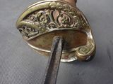 a metal object that is being sold on the table