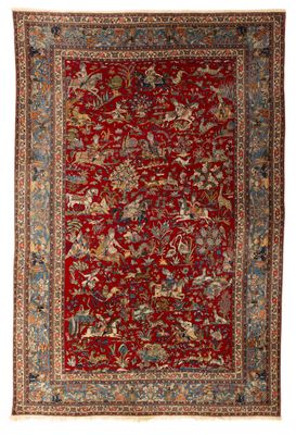 un tapis rouge et bleu à motifs floraux