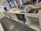 an image of a kitchen with a sink and a counter