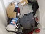a bag full of clothes and other items in it