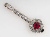 an image of a diamond and ruby broochle pin