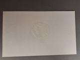 a close up of a piece of paper with a stamp on it