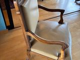 a chair that is sitting on a hard wood floor
