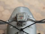 a close up view of a motorcycle with a speedometer on the handlebars