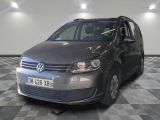 a picture of a grey vw tourer parked in a garage
