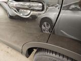 a reflection of a car in a mirror on the side of a car