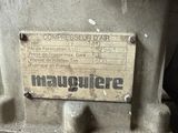 a sign on the back of a machine that is sitting on a table