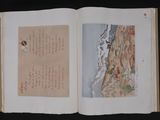 an open book with a picture of a beach and a bird on it