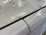 a close up of a white washer and dryer in a room