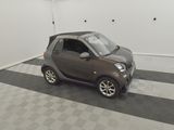 a small car that is parked in a garage