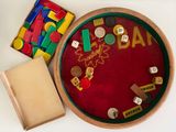 a wooden tray with a game board and a box of wooden blocks