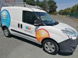 a van that is parked on the side of the road
