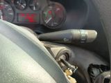 a close up of a car dashboard with a microphone in it