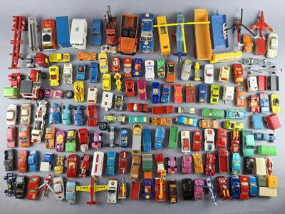 a lot of toy cars that are on the table
