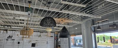 a room with a lot of hanging objects on the ceiling