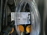 a close up of a hose connected to a machine