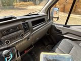 a view of the inside of a vehicle from the driver ' s seat