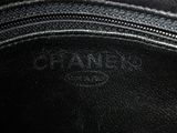 a close up of a black purse with a zipper on it