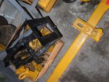 a large yellow machine that is sitting in the garage