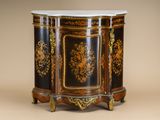 a black and gold cabinet with a marble top