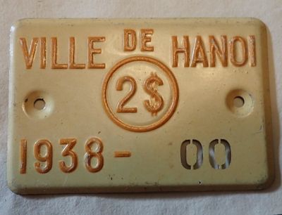 une plaque jaune avec l'image d'un vingt vingt vingt vingt vingt vingt vingt vingt vingt vingt vingt vingt vingt vingt vingt vingt vingt vingt vingt vingt vingt vingt