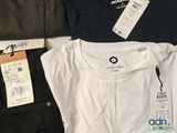 three pairs of black and white t - shirts and a pair of black and white pants