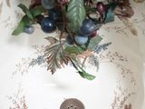 a bowl with a bunch of berries in it