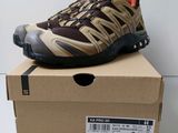 salomon men ' s hiking shoes in a box