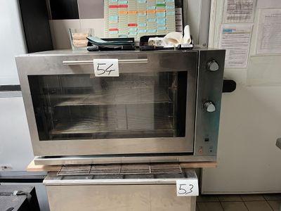 an image of a stainless steel oven in a kitchen